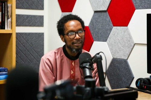 Chernoh Bah in podcast studio